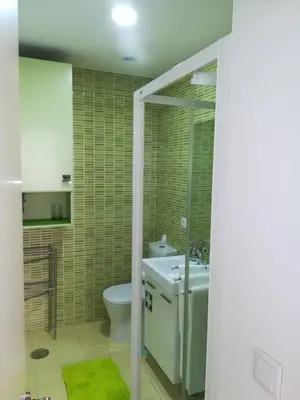 a bathroom with a toilet and a sink at Be Happy in Porto in Porto