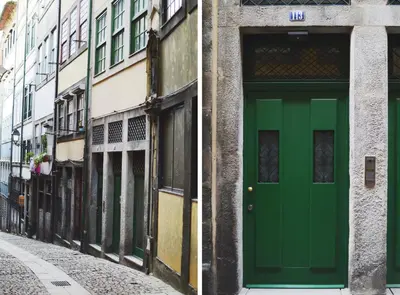 a green door on the side of a building at Elisa Apartment in Porto