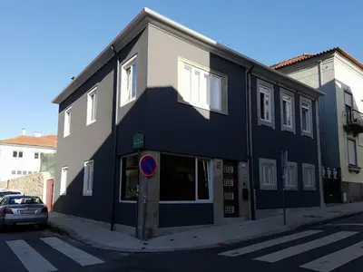 a black and white building on the side of a street at PORTO CONCEPT HOME - Paranhos in Porto