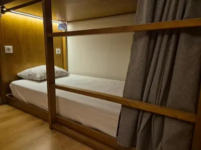 a couple of bunk beds in a room at Sweet Swell in Porto