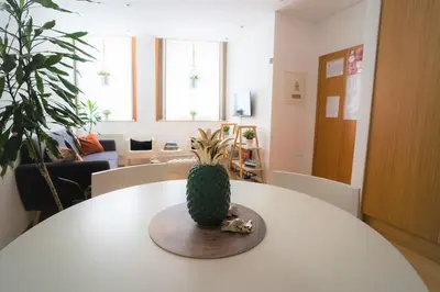 a pineapple sitting on top of a table at Downtown Porto Relaxed Apartment with Private Yard in Porto