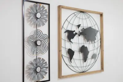 two framed pictures of a world on a wall at Casa Sá Noronha Old Town in Porto