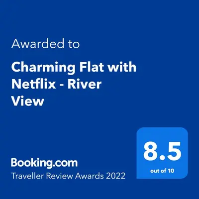 a screenshot of a cell phone with the text upgraded to channel flat with netflix at Host Wise - Charming Flat with Netflix - River View in Porto
