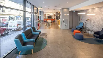 a corridor of an office with a hallway at Holiday Inn Express Porto City Centre by IHG in Porto