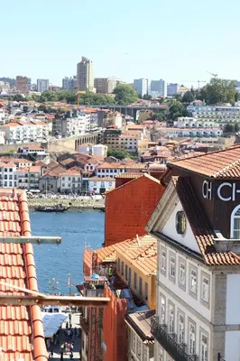 a view of a city with a river and buildings at HM - Ribeira São João 2E in Porto