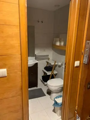 a bathroom with a toilet and a sink at Musica4 in Porto