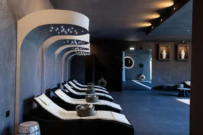 a room with a row of white chairs at Rubens Hotels & SPA in Vila Nova de Gaia
