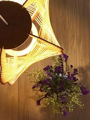 a bouquet of flowers in a vase on a table at Casa do Bairro 2 in Porto