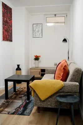 a living room with a couch and a table at River Flat I - Heart of Porto in Porto