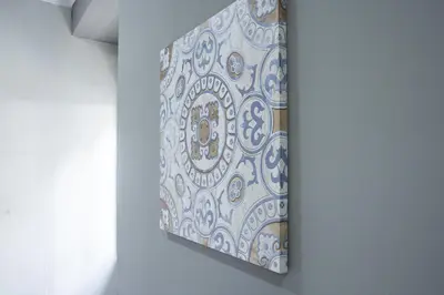 a painting hanging on a wall in a room at D'OURO DOM MANUEL By LW in Vila Nova de Gaia