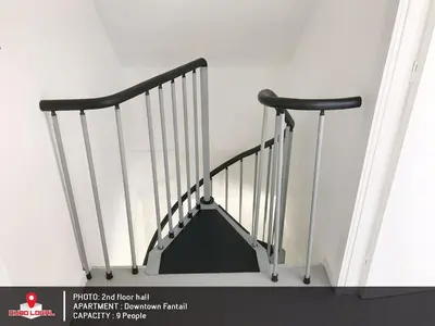 a staircase with two black and white railings at Downtown Fantail in Porto