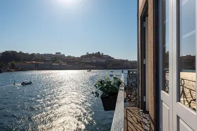a view of a river from a window of a building at Porto Premium River View II in Porto
