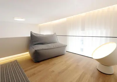 a living room with a couch and a chair at HM - Oporto Cedofeita 500B in Porto