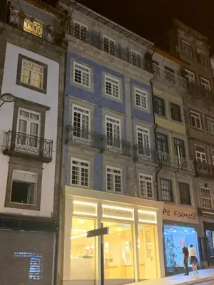 a building with a store in front of it at Clérigos Prime Suites by Porto City Hosts in Porto