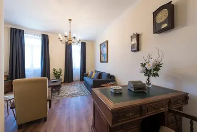 a living room with a couch and a table at LovelyStay - Heritage Collection House with 4Bedrooms in Porto