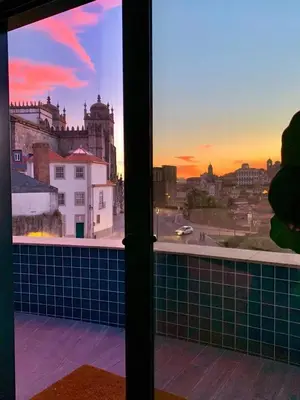 a view of a city skyline from a window at Spacious Apartment in Porto with Terrace in Porto