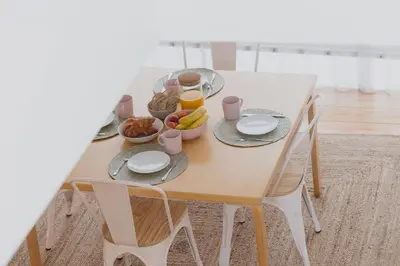 a table with breakfast foods and drinks on it at Casa Castanha in Porto