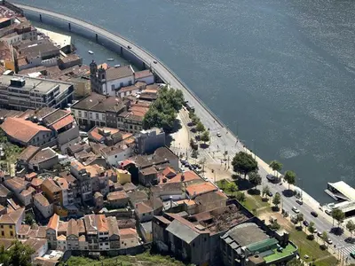 an aerial view of a city with a bridge at Casa Castanha in Porto