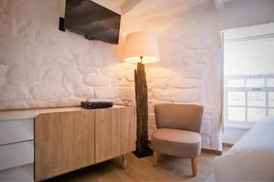 a bedroom with a desk with a chair and a lamp at Porto & Douro Best Views by PCH in Porto