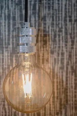 a glass jar with a light inside of it at Liiiving in Porto - Cozy & Chic Downtown in Porto