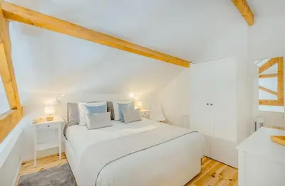 a living room with a table and a couch at Oporto Bonjardim Loft in Porto