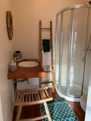 a bathroom with a sink and a shower at Oak Valley Flats Porto Santa Catarina in Porto