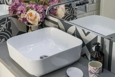 a white sink on a counter in a bathroom at Porto Insight Apartments Campanhã in Porto
