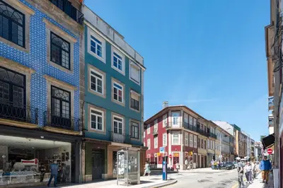 a group of buildings on a city street at Cedofeita Deluxe Apartment 3B in Porto