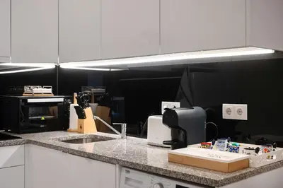 a kitchen with a counter top with a sink at Refugio in Porto