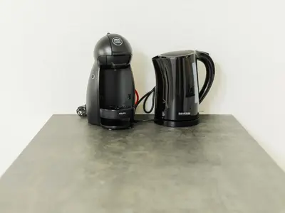 two appliances sitting on top of a counter at Angel Flats in Porto