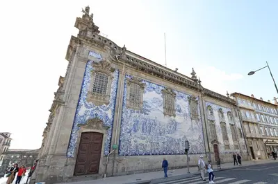a building with a mural on the side of it at FLH Porto Spacious Flat in Porto