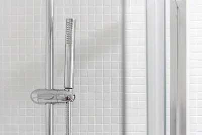 a shower with a shower head in a bathroom at GuestReady - Bay Watch in Porto