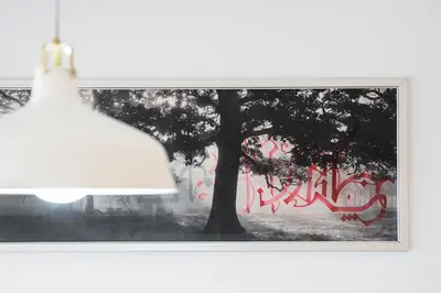a picture of a tree in front of a window at GuestReady - Paragon in Porto in Porto