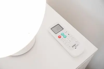 a remote control sitting on top of a white envelope at GuestReady - Paragon in Porto in Porto