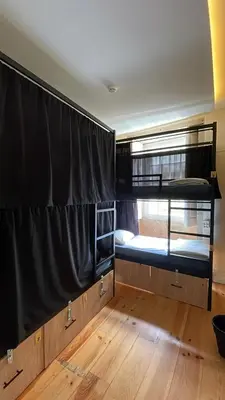 a room with two bunk beds in it at Onefam Ribeira in Porto