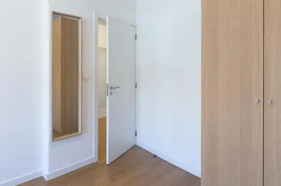 an empty room with a closet and a mirror at Host Wise - Annas Flats II in Vila Nova de Gaia