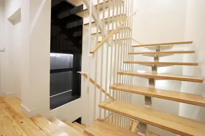 a staircase in a house with wooden steps at HM - Pinheiro Downtown Living in Porto
