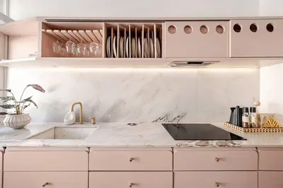 a kitchen with white marble countertops and a sink at AMAZING DUPLEX - Mid Century Experience & PARKING in Porto