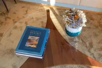 a book sitting on top of a table at Urban Apartment Casa da Portela in Porto