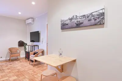a living room with a couch and a table at FindMe InPorto Santa Catarina in Porto