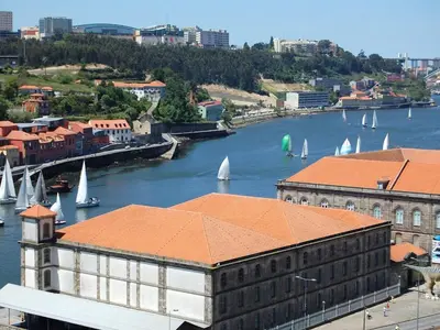 a view of a river with boats in the water at Top Flat in Porto