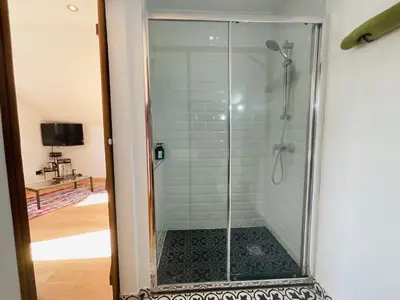 a bathroom with a sink and a toilet in a room at Boreal Porto Gaia - Patio & Pool in Vila Nova de Gaia
