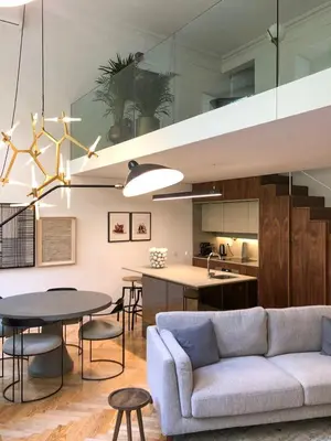 a living room with a couch and a table at Oporto Chic&Cozy - Ateneu in Porto