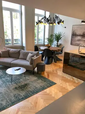 a living room with a couch and a table at Oporto Chic&Cozy - Ateneu in Porto