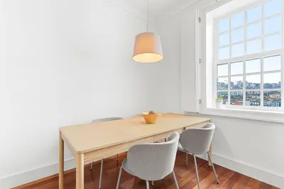 a white door with a sign on it at GuestReady - Ribeira Apt in Porto center in Porto