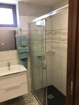 a bathroom with a shower and a sink at OPORTO APARTMENT LUXURY in Porto