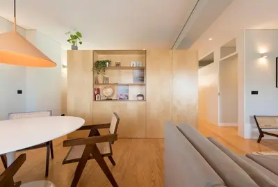 a dining room with a table and chairs at Ceuta 33 Apartment in Porto