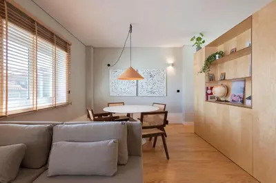 a living room with a couch and a table at Ceuta 33 Apartment in Porto
