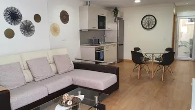 a living room with a couch and a table at Marques Garden with PARKING in Porto