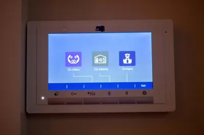 a computer screen with icons on a wall at Oporto Ana's Studio in Porto